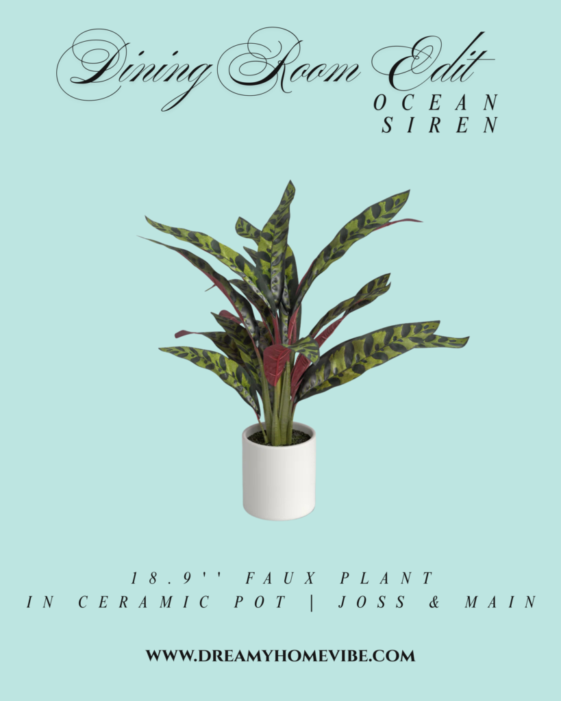 18.9'' Faux Plant in Ceramic Pot from Joss & Main. It has thin tall leaves with light and dark green strips on top and the underside is a bright pink/red color. Plant is in a plain cylindrical white pot.